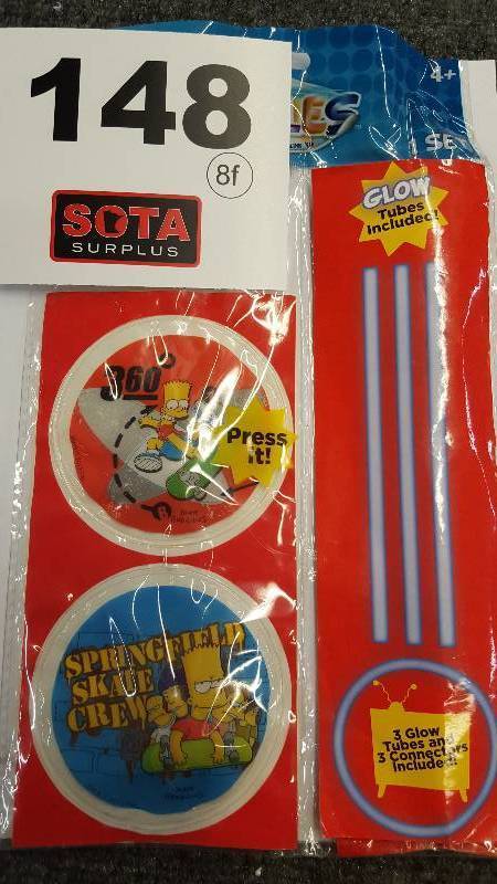 lot 148 image: SIMPSONS YAZZLES LIGHT UP GLOW BADGE
