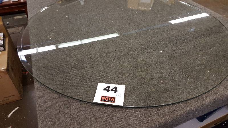 lot 44 image: 48 Round Dinning Table Glass top Only   (Glass Retail $200.00)