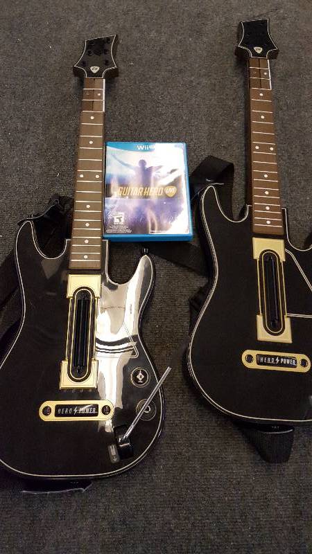 lot 96 image: Wii U Guitar Hero Live Bundle with 2 Guitar Hero Live Wireless Guitar Controllers
