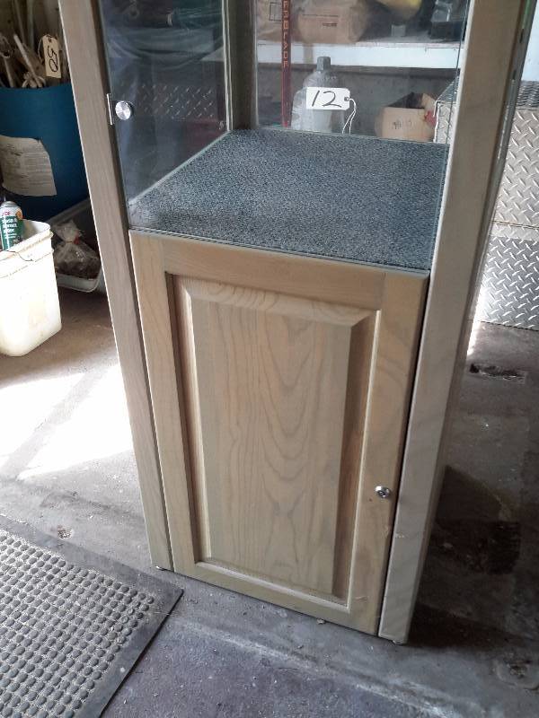 lot 8 image: Tall Glass and wood Display cabinet.
