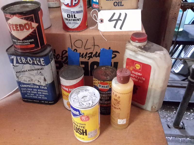 lot 41 image: Misc. Oils and Automotive Liquids.. Most cans full
