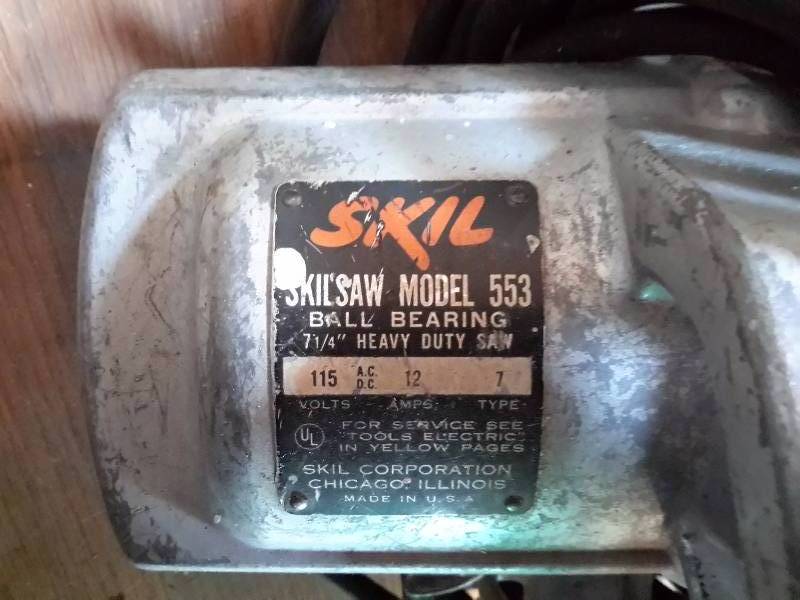 lot 58 image: SKIL  Brand, 7 14 in Model 553, Ball Bearing, Skil Saw.. This works