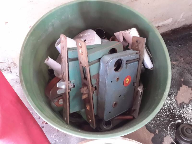 lot 48 image: Old Commercial Door Hardware, Folding Chair, Daiwa Fishing Pole and reel.