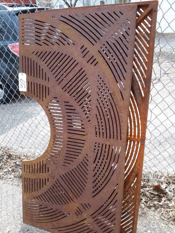 lot 39 image: 48in x 48 in, 2 part, Heavy Steel Tree Surround.. Bring your own loading help.