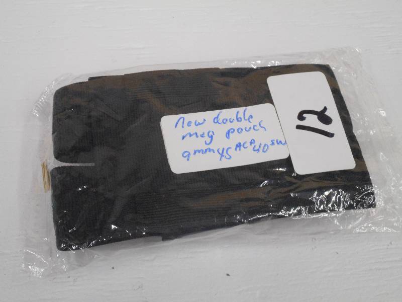 lot 12 image: New Double Mag Pouch, 9mm--45ACP--4...
