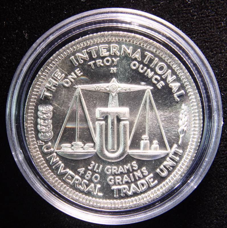1 TROY OZ. .999 FINE SILVER 1973 INTERNATIONAL WORLD TRADE UNIT IN AIRTITE HOLDER