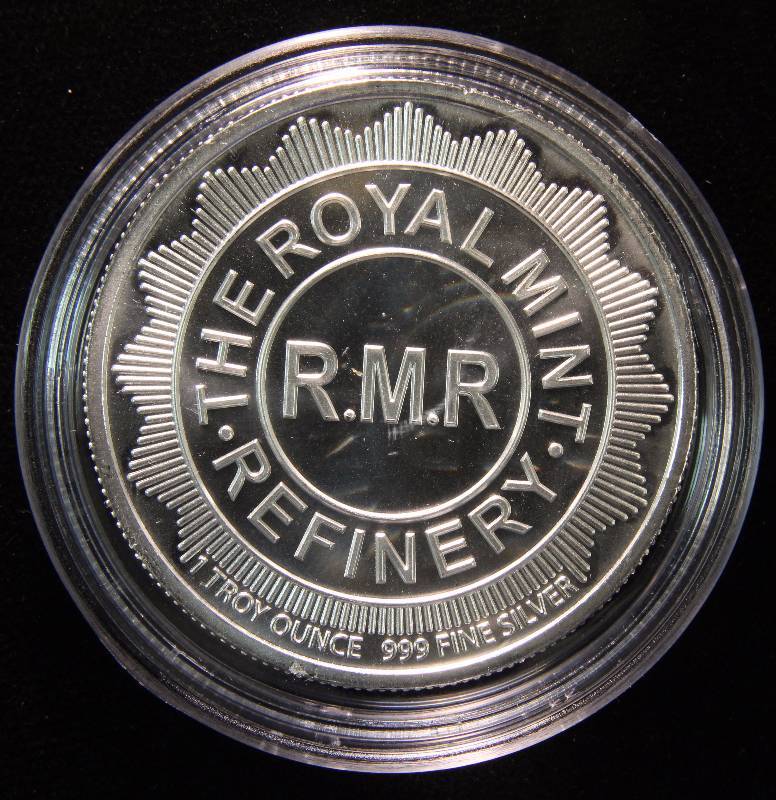 1 TROY OZ. .999 FINE SILVER ROUND SHIELD DESIGN ROYAL MINT REFINERY IN AIRTITE HOLDER
