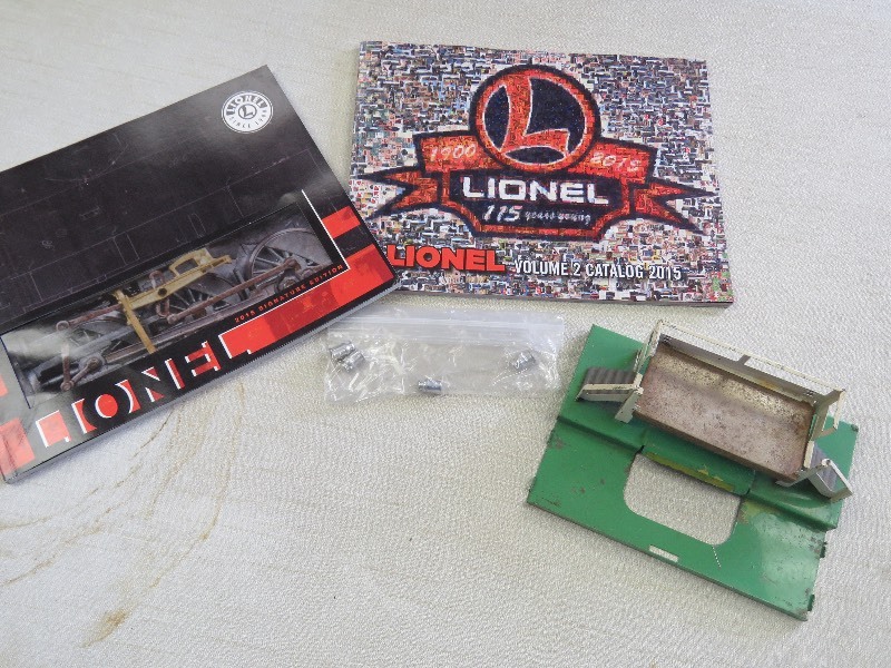 lot 200 image: Lionel Catalogs, 4 Milkcans and Metal Ladder