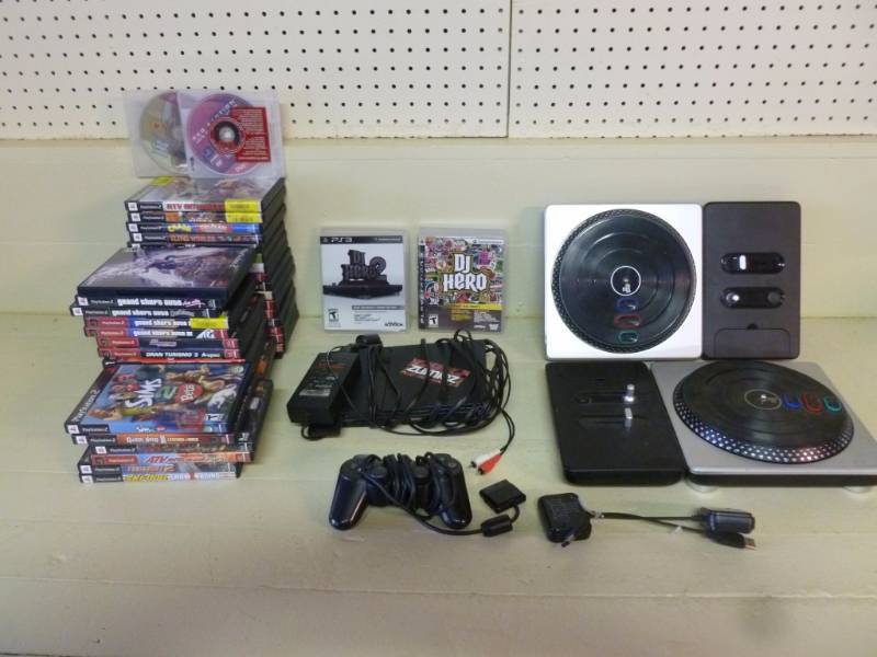 lot 1 image: Playstation 2 Game Console With Games