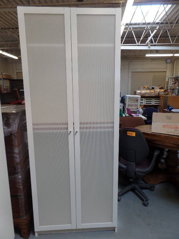 lot 3 image: Ikea Storage Cabinet