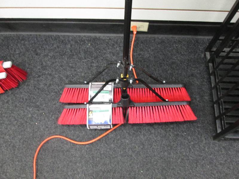 lot 100 image: Lot of 2 red pushbrooms(1 Handle on...