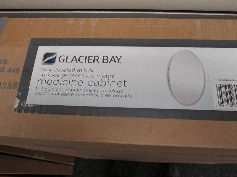 lot 107 image: Glacier Bay 20 in Oval Mirror Medic...