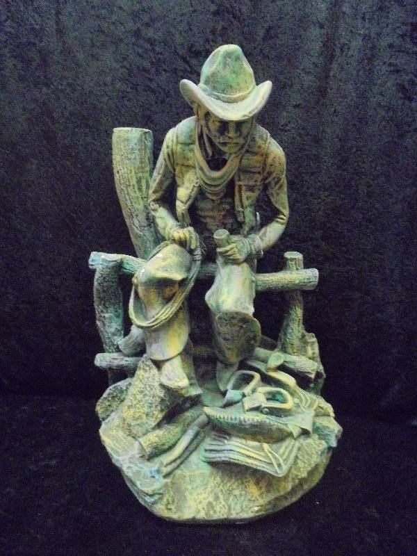 lot 68 image: Cowboy on Fence Statue - Large