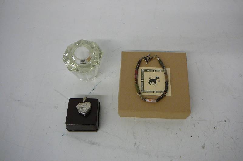 lot 65 image: Silver Hart Locket, old glass door handle, coyote beads bracelet