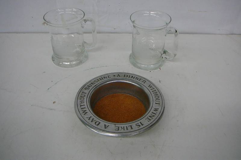 lot 80 image: Etched Ship Beer Mugs, Wind holder ( a dinner without wine is a day without sunshine)