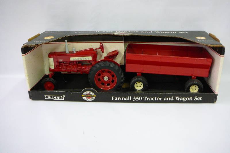 lot 8 image: Farmall 350 Tractor and Wagon Set 116 Scale