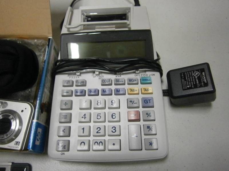 lot 67 image: HP M425 Camera, Adding Machine, WiFi Adapter