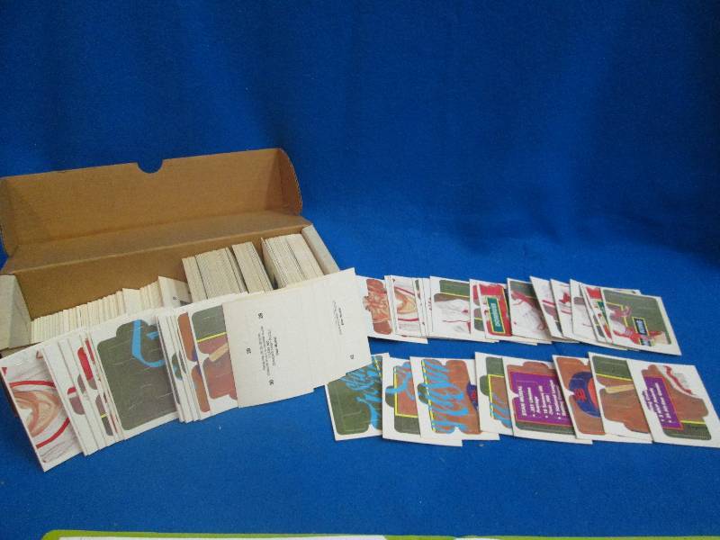 lot of punch out puzzle piece cards...
