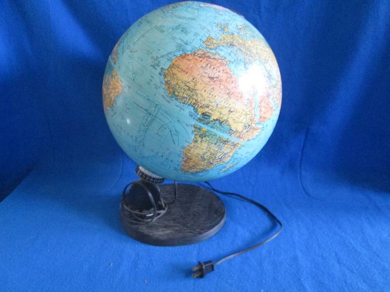 World globe on stand, with coordina...