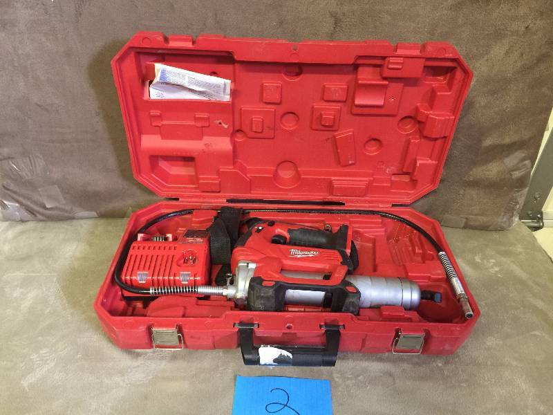 lot 2 image: Milwaukee M18 18-Volt Lithium-Ion Cordless 2-Speed Grease Gun (Tool and battery charger only) Used