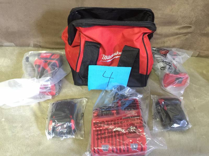 lot 4 image: Milwaukee M18 18-Volt Lithium-Ion Cordless Combo Kit (2-Tool) with Stick Light and Power Source New