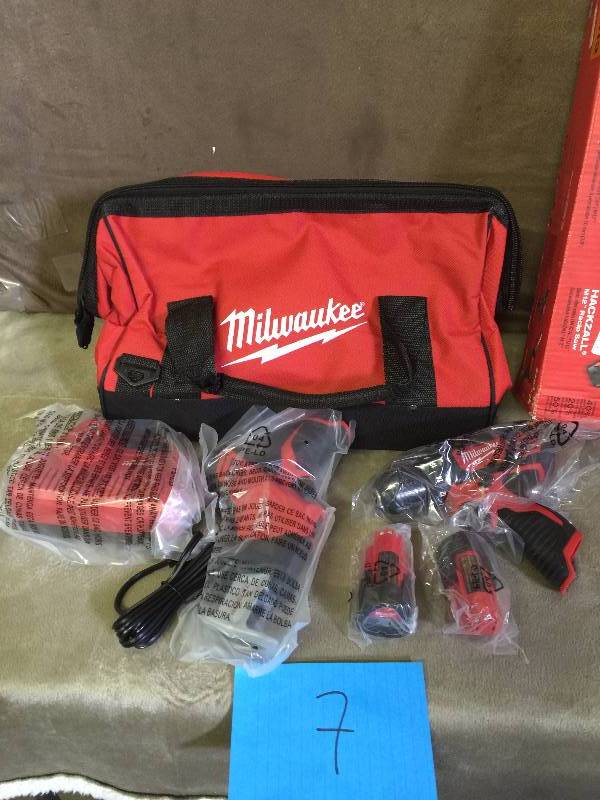 lot 7 image: Milwaukee 2493-22 M12 12-volt 38 In. Lithium-ion Cordless Drilldriver Hackzall Combo Kit new
