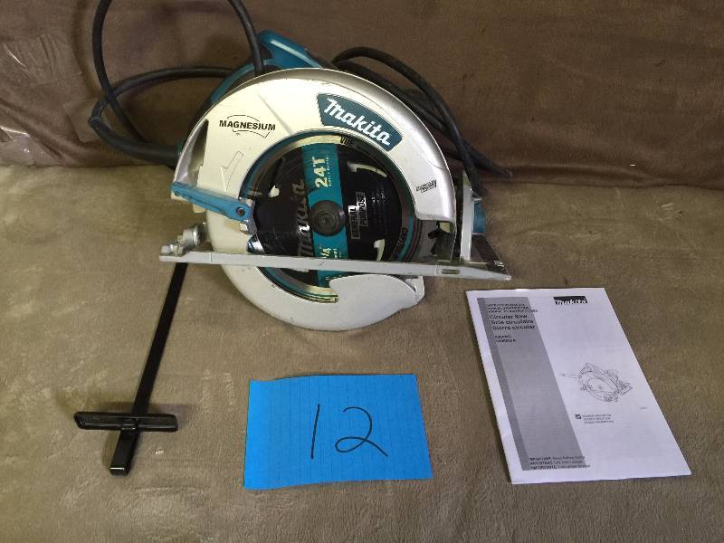 lot 12 image: makita 15-Amp 8-14 in. Magnesium Circular Saw Model # 5008MGA used working conditions