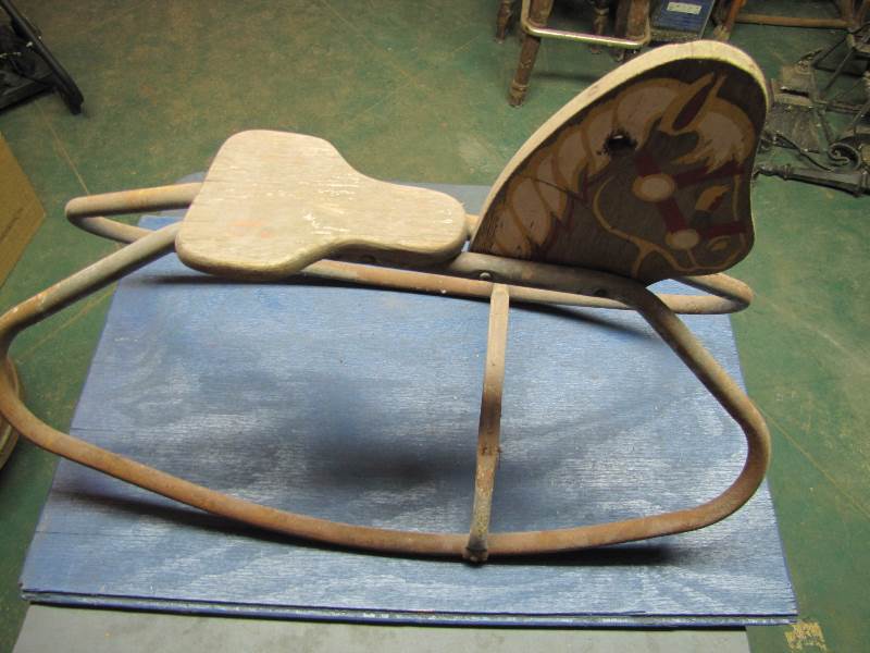 antique metal rocking horse