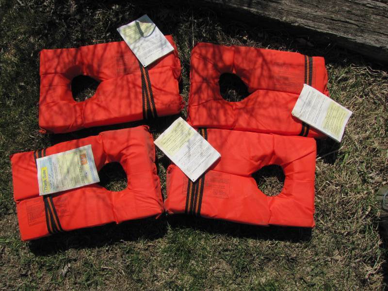 4 Life Jackets  Floatation Device