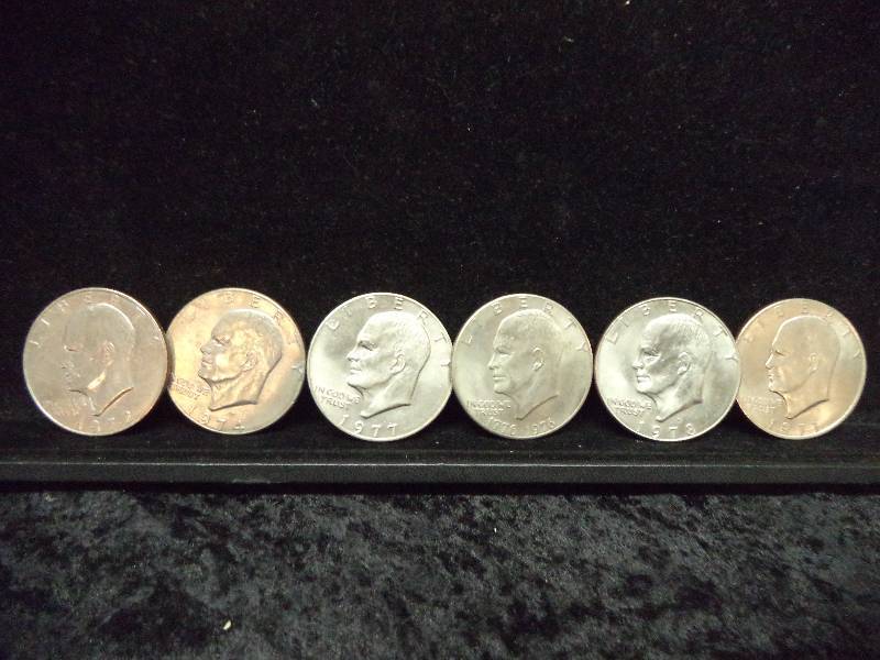 Lo t- 6 Ike Dollars