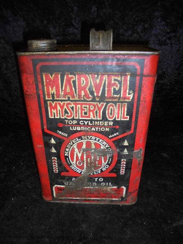 lot 8 image: Metal 1 gallon Marvel Mystery Oil Can