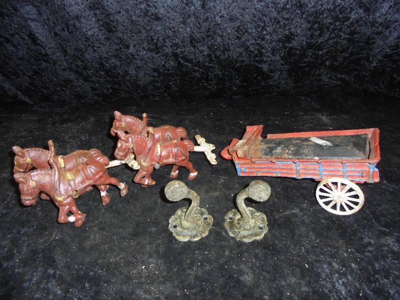 lot 12 image: Lot - Cast HorseWagon & Hooks