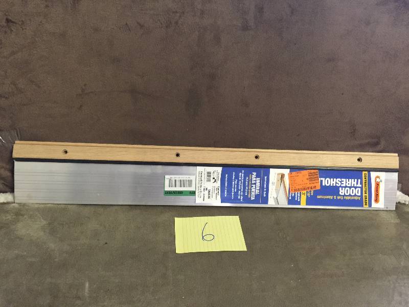lot 6 image: Frost King  EO 5-58 in. x 36 in. Adjustable Threshold Model # TAOC36A new
