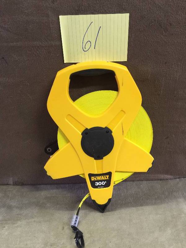 lot 61 image: Dewalt 300 ft. Open Reel 34 in. Fiberglass Long Tape