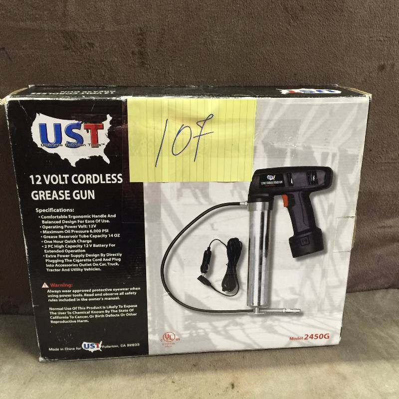 lot 107 image: UST 12 Volt Cordless Grease Gun missing battery