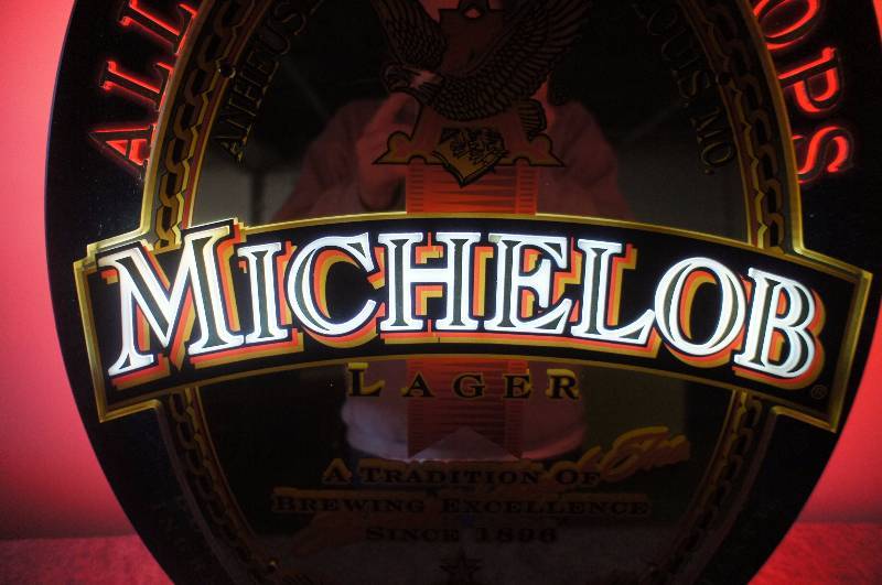 lot 52 image: Michelob 3 color backlit Neon Oval Shaped Sign (great aura)