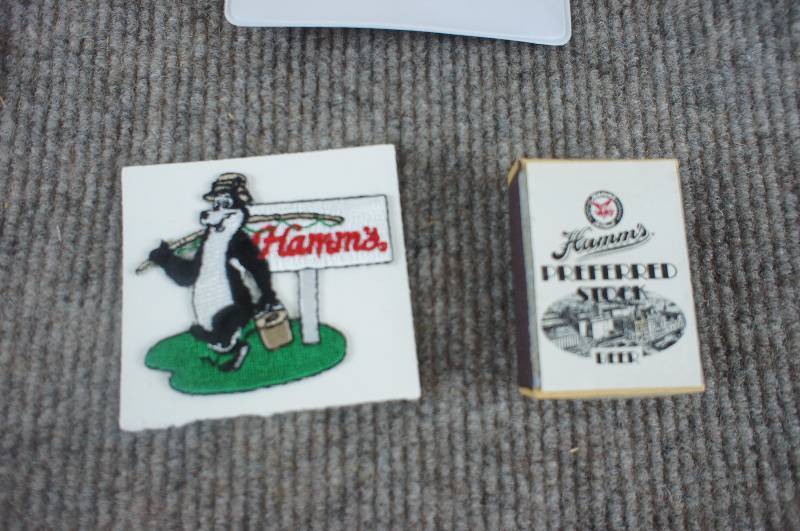 lot 53 image: Hamms Lot of Stickers, Matchbook, Pen Protector, Sew on Patch