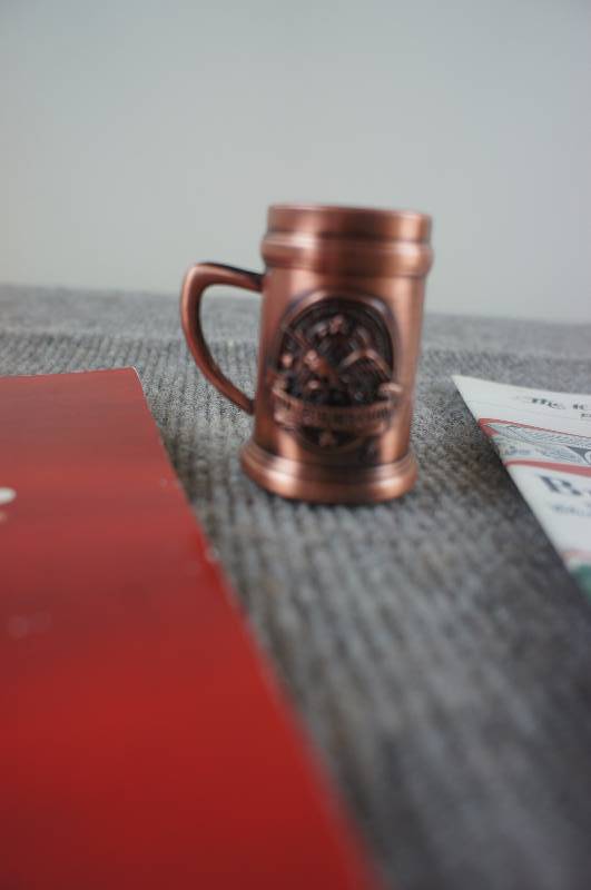 lot 54 image: Budweiser Cookbook Mini Stein and Booklet