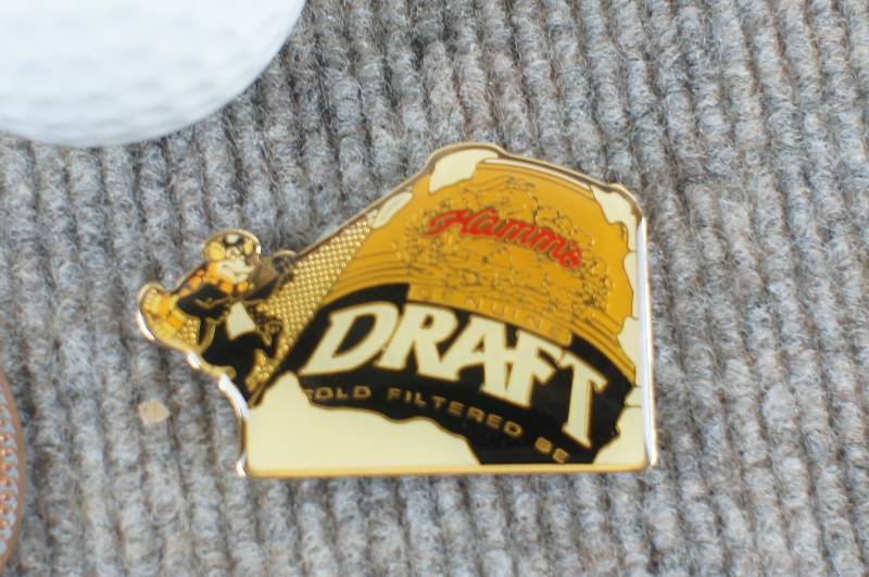 lot 57 image: Hamms Magnet, Golf ball, Flattened Penny