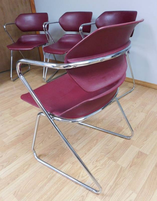 lot 28 image: Four Metal Maroon Chairs