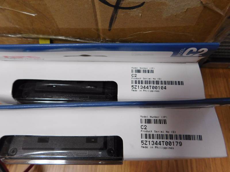 lot 11 image: Two APC Wall Mount Power Filter