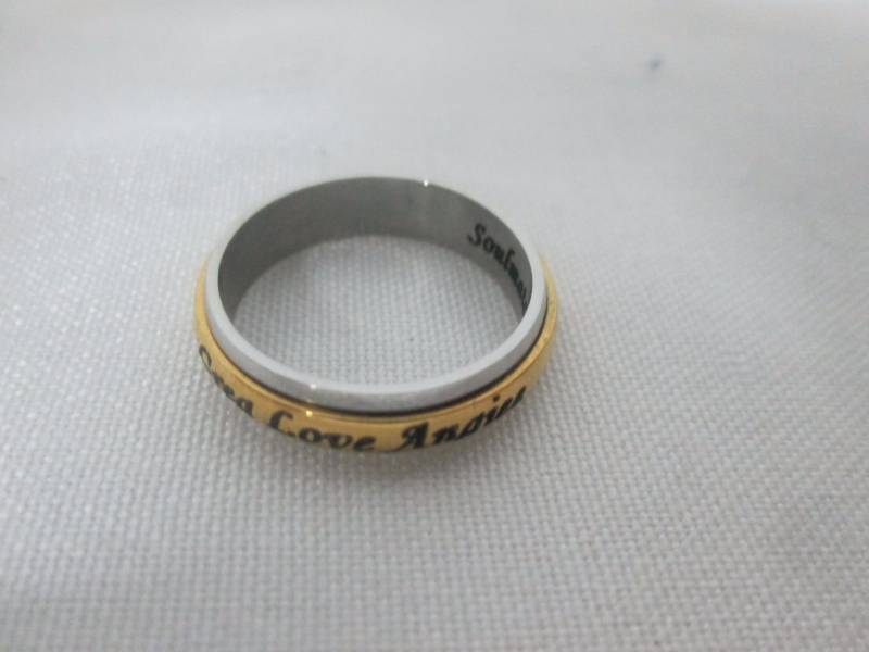 lot 84 image: Ladies Stainless Steel Personalized Couples Spinner Band