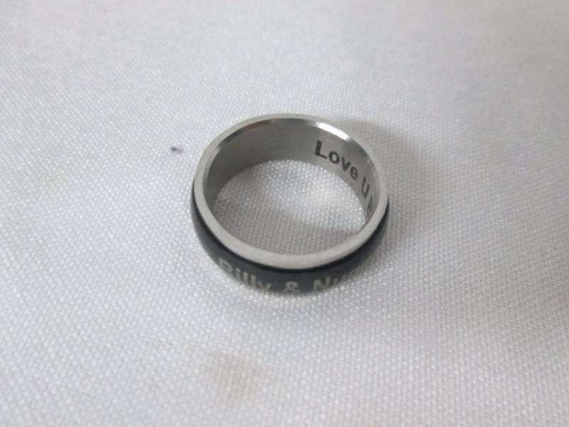 lot 79 image: Stainless Steel Mens Personalized Couples Spinner Ring