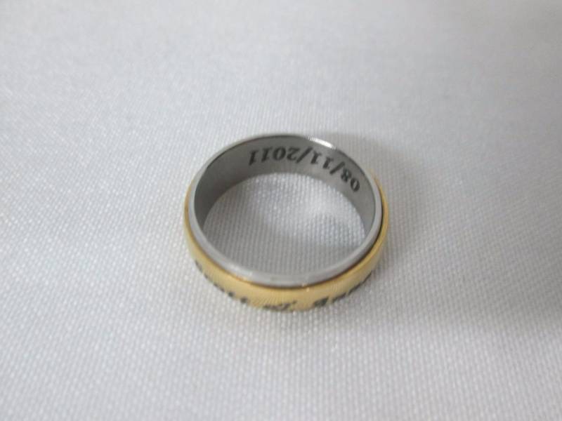 lot 78 image: Mens Stainless Steel Personalized Couples Spinner Band