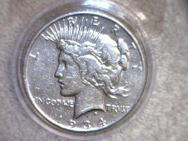 lot 14 image: 1934 D Peace Silver Dollar