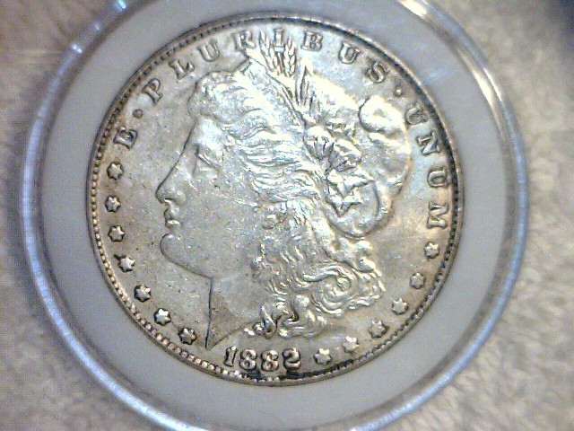 lot 6 image: 1882 CC Morgan Silver Dollar