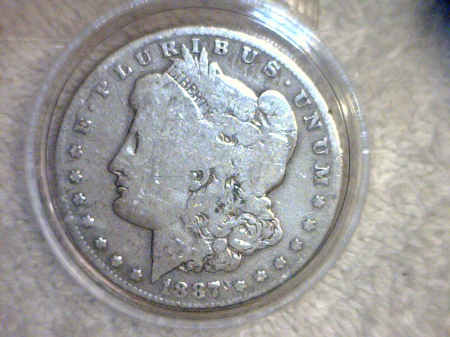 lot 8 image: 1987 O  Morgan Silver Dollar