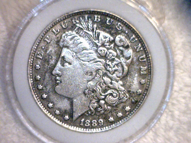 lot 5 image: 1889 CC Morgan Silver Dollar