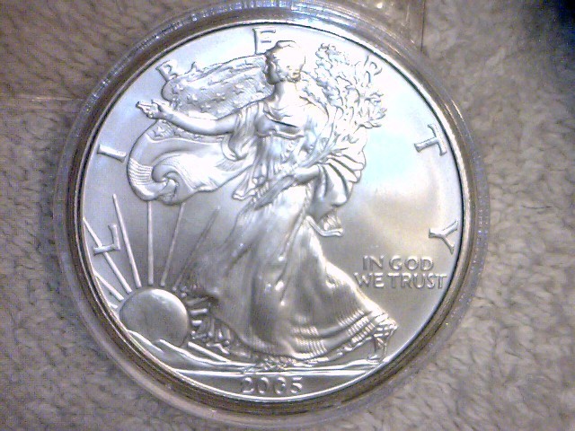 lot 25 image: 2005 P BU Walking Liberty Silver Dollar, one ounce