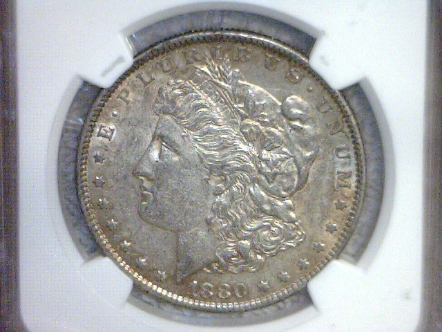 lot 43 image: 1880 O NGC Authenticated Silver Dollar